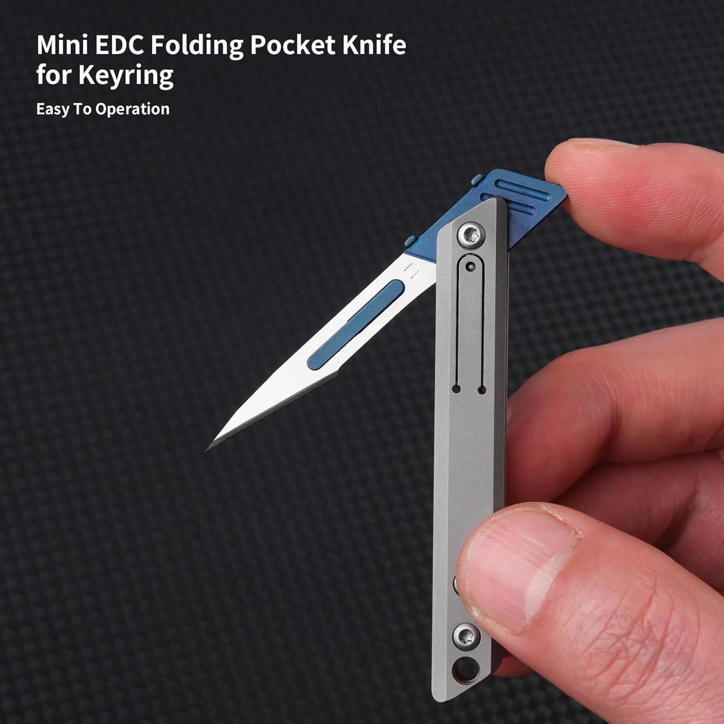 Compact Titanium Utility Knife with Replaceable Blades